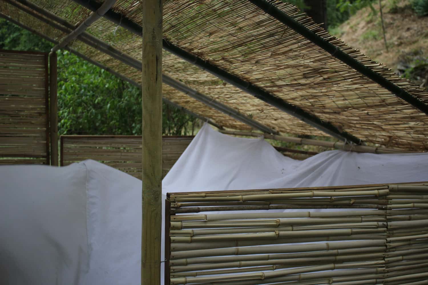 We added a cotton tent that gives privacy and protects from mosquitos